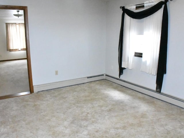 unfurnished room with baseboards