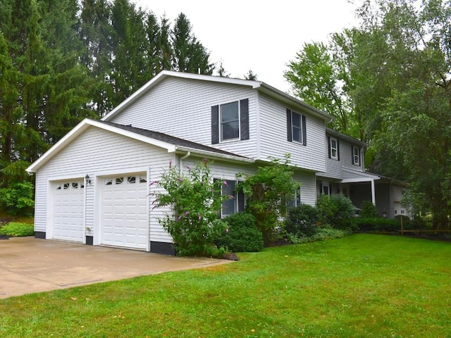 view of side of home featuring concrete driveway, an attached garage, and a lawn