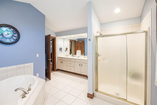 10170 Tiger Lily Ln, Waterford, PA 16441 - bathroom with a shower stall, a bath, double vanity, lofted ceiling, and tile patterned flooring