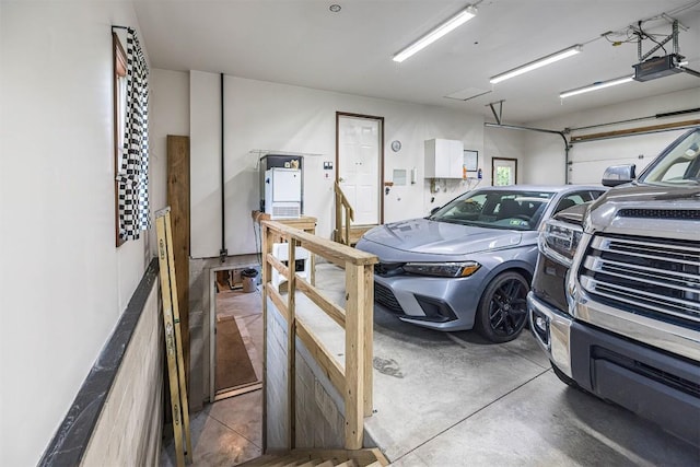10170 Tiger Lily Ln, Waterford, PA 16441 - garage featuring a garage door opener