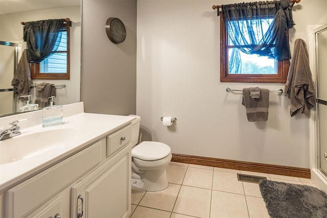 10170 Tiger Lily Ln, Waterford, PA 16441 - full bath featuring a shower with door, toilet, tile patterned floors, vanity, and baseboards