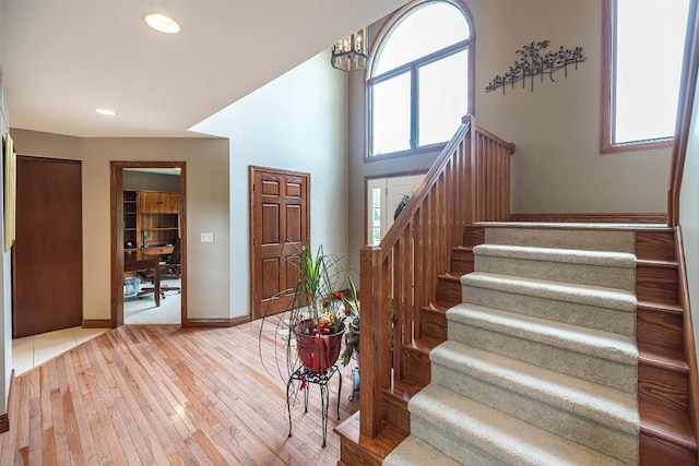 10170 Tiger Lily Ln, Waterford, PA 16441 - foyer with stairway, light wood finished floors, baseboards, a chandelier, and recessed lighting