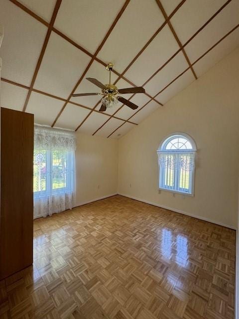 spare room featuring ceiling fan and light parquet floors