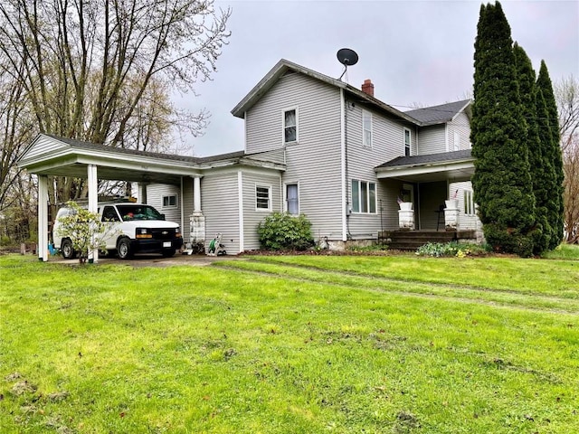 9967 Smith St, Lake City Borough, PA 16423 - exterior space with a yard, covered porch, a chimney, and an attached carport