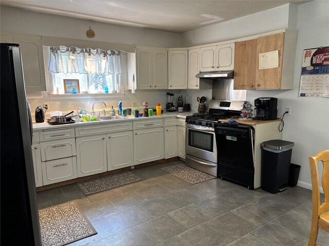 9967 Smith St, Lake City Borough, PA 16423 - sunroom featuring plenty of natural light and a wood stove