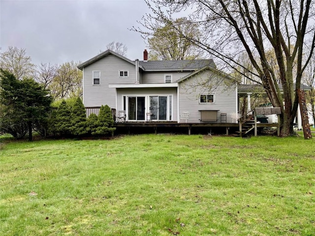 9967 Smith St, Lake City Borough, PA 16423 - rear view of property with a lawn, a chimney, and a wooden deck