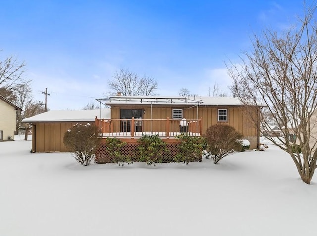 view of front of property with a deck