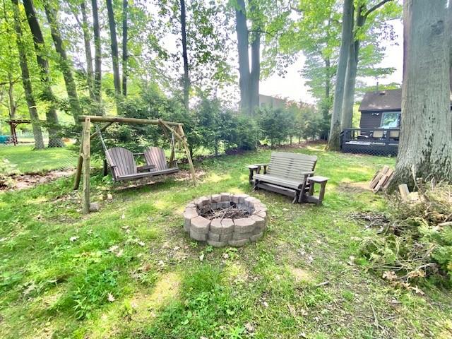 10634 N Edgewood Dr, Lake City Borough, PA 16423 - view of yard featuring an outdoor fire pit