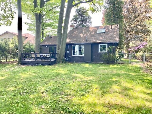 10634 N Edgewood Dr, Lake City Borough, PA 16423 - back of property with a deck