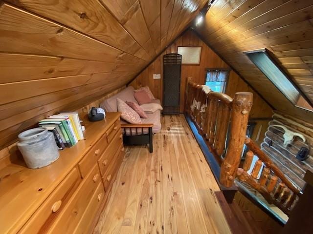 10634 N Edgewood Dr, Lake City Borough, PA 16423 - additional living space with wood ceiling, wooden walls, light wood-style floors, and vaulted ceiling