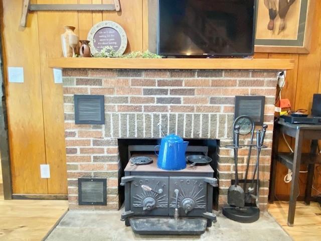 10634 N Edgewood Dr, Lake City Borough, PA 16423 - detailed view of a wood stove and wood finished floors