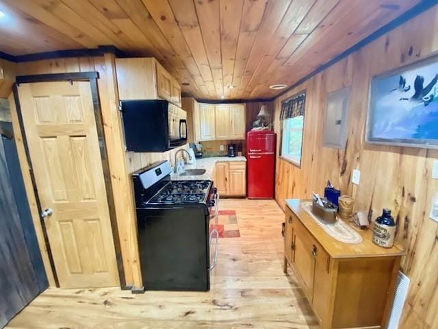 10634 N Edgewood Dr, Lake City Borough, PA 16423 - kitchen with stainless steel gas range, wood ceiling, black microwave, electric panel, and a sink