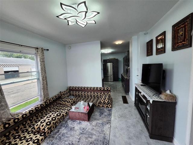 living room featuring a chandelier