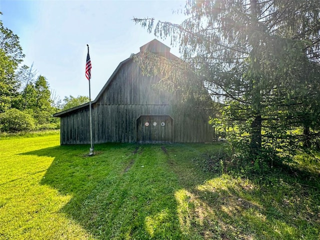 21380 S Center Rd, Conneautville, PA 16406 - view of barn with a lawn