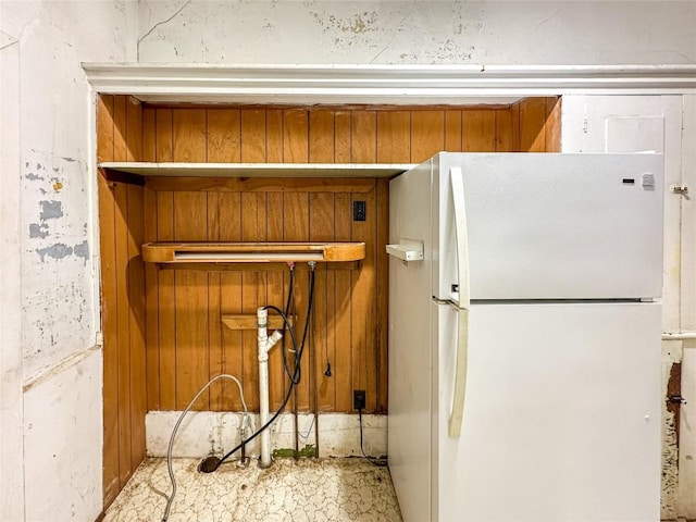 21380 S Center Rd, Conneautville, PA 16406 - detailed view of freestanding refrigerator and wood walls