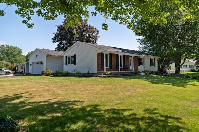 5243 W 53rd St, Fairview, PA 16415 - ranch-style home featuring a garage, a front lawn, covered porch, and brick siding