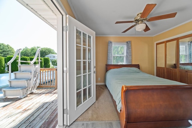5243 W 53rd St, Fairview, PA 16415 - bedroom featuring access to outside, wood finished floors, ornamental molding, and a ceiling fan