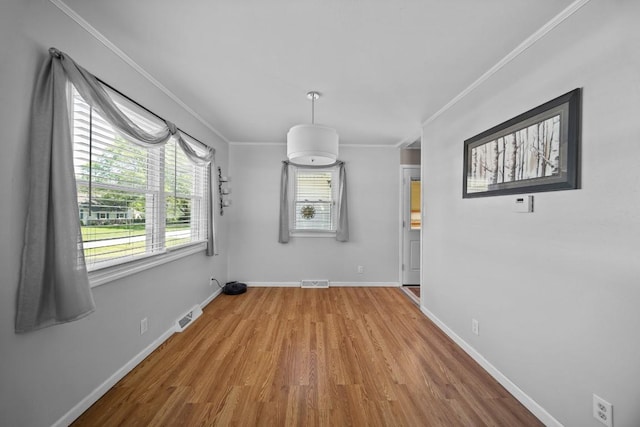 5243 W 53rd St, Fairview, PA 16415 - unfurnished dining area with wood finished floors and ornamental molding
