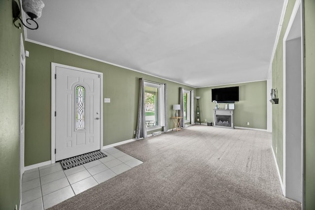 5243 W 53rd St, Fairview, PA 16415 - foyer entrance featuring a fireplace, carpet, tile patterned flooring, and crown molding