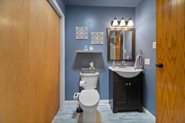 5243 W 53rd St, Fairview, PA 16415 - bathroom with toilet and vanity