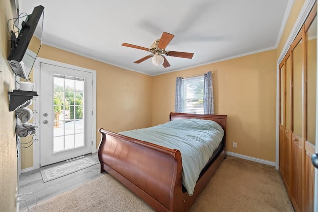 5243 W 53rd St, Fairview, PA 16415 - bedroom featuring access to outside, crown molding, a ceiling fan, a closet, and light wood-style floors