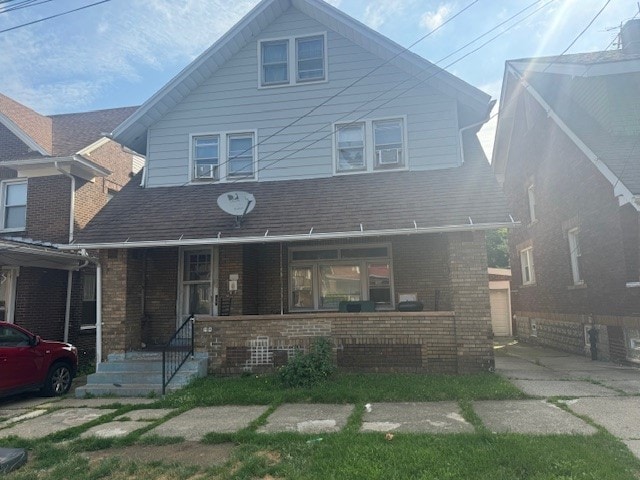 view of front facade featuring covered porch