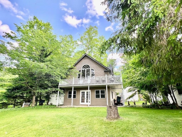 13478 Old Lake Rd Unit 62, East Springfield, PA 16411 - rear view of property featuring french doors, a lawn, and a deck
