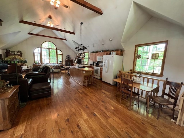 13478 Old Lake Rd Unit 62, East Springfield, PA 16411 - dining room with ceiling fan, dark wood-type flooring, and lofted ceiling