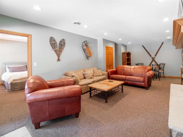 carpeted living room with recessed lighting and visible vents