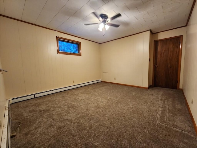 spare room with carpet, baseboard heating, crown molding, and ceiling fan