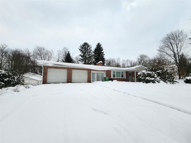 single story home featuring a garage