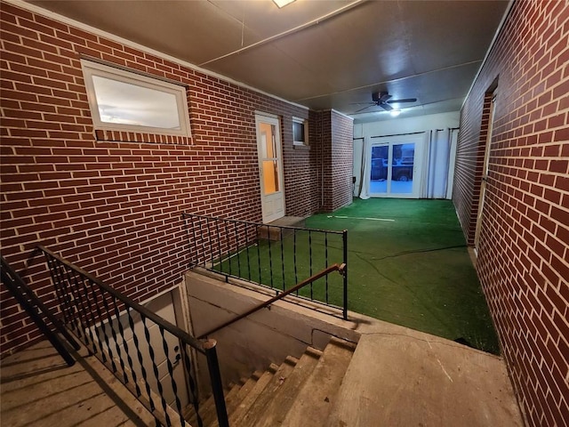 corridor with brick wall