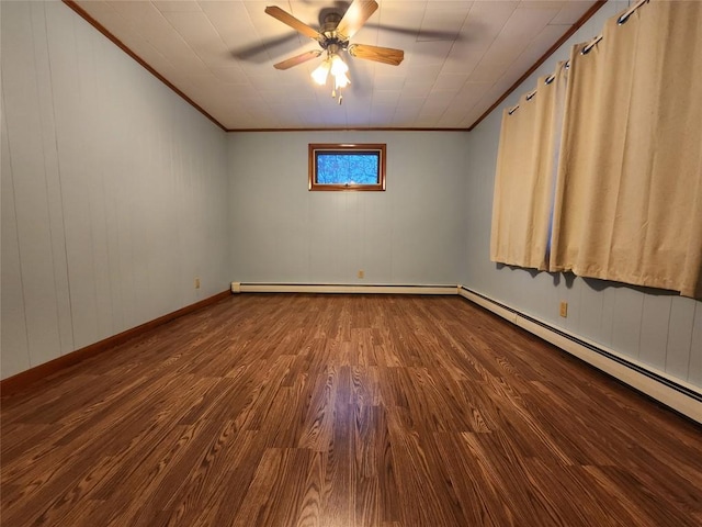 unfurnished room featuring ceiling fan, wood-type flooring, a baseboard radiator, and ornamental molding