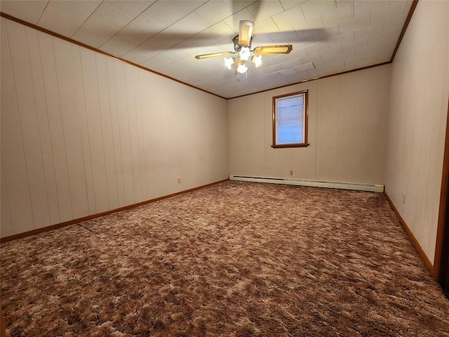 carpeted spare room featuring ceiling fan, crown molding, and baseboard heating