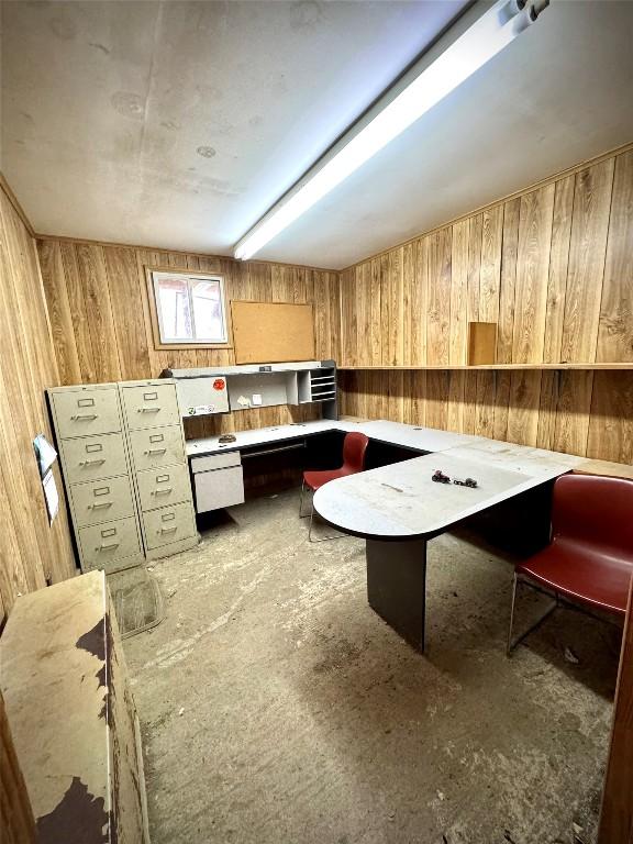 kitchen featuring wooden walls