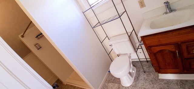 2677 Cherry St, Erie, PA 16508 - bathroom with vanity, toilet, and baseboards