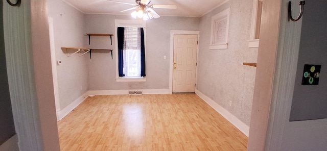 2677 Cherry St, Erie, PA 16508 - empty room with visible vents, ceiling fan, wood finished floors, and ornamental molding