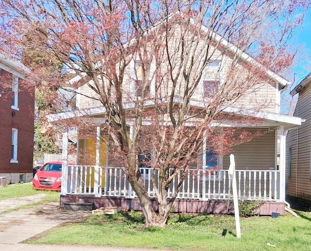 2677 Cherry St, Erie, PA 16508 - view of front of home featuring a porch and a front yard