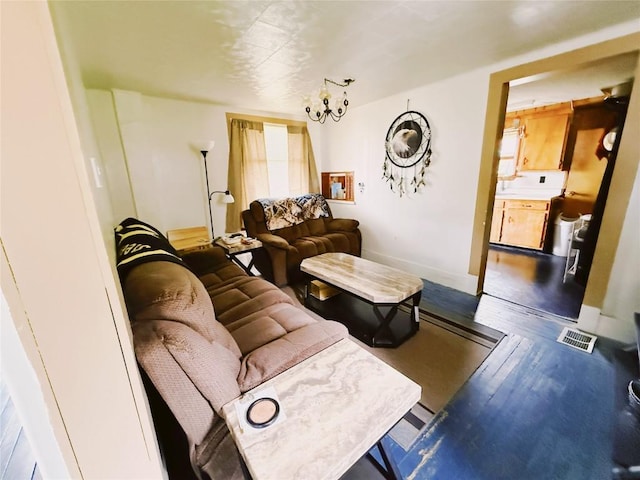 432 S Main St, Cambridge Springs Boro, PA 16403 - living area with baseboards and a chandelier