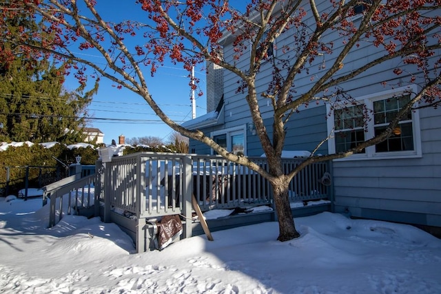 view of snow covered deck