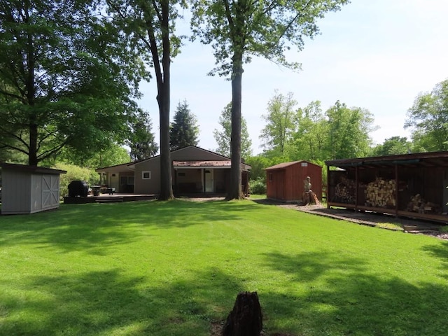 1900 Navaho Rd, Jamestown, PA 16134 - view of green lawn with a storage shed