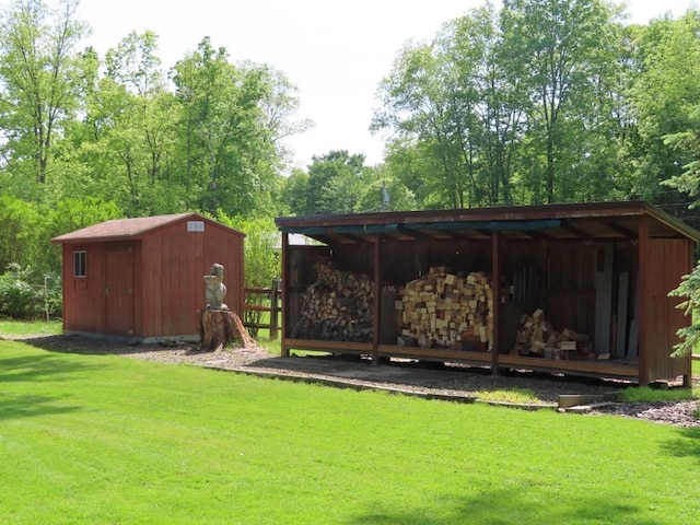 1900 Navaho Rd, Jamestown, PA 16134 - view of grassy yard featuring a pole building and a storage unit