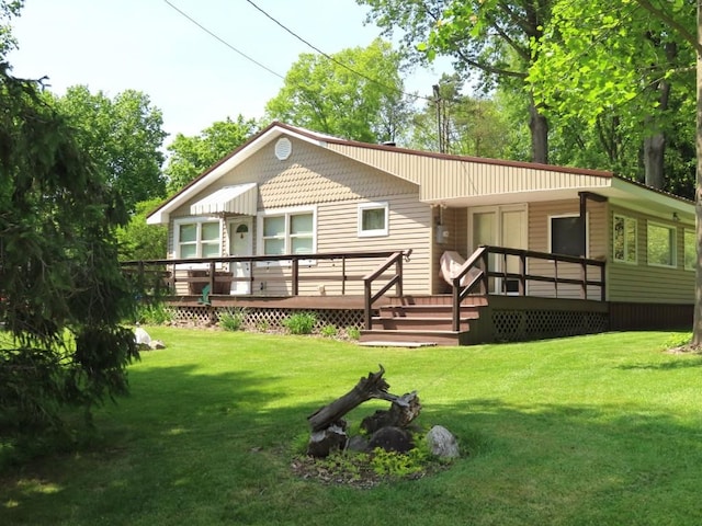 1900 Navaho Rd, Jamestown, PA 16134 - view of front of house featuring a deck and a front lawn