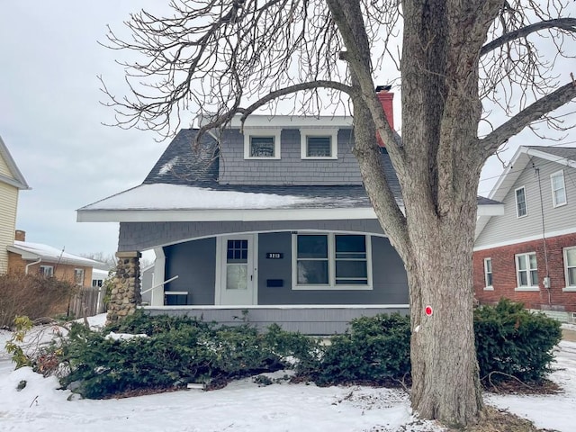 view of front of property featuring covered porch