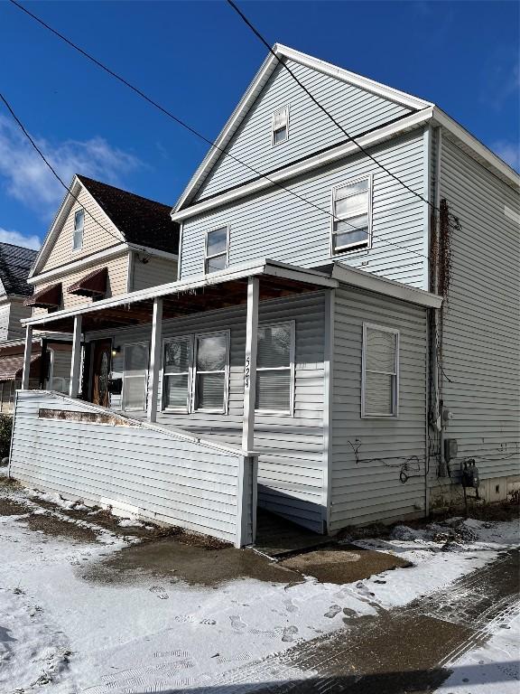 view of property with a porch