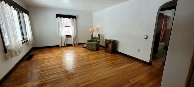 living area featuring hardwood / wood-style flooring