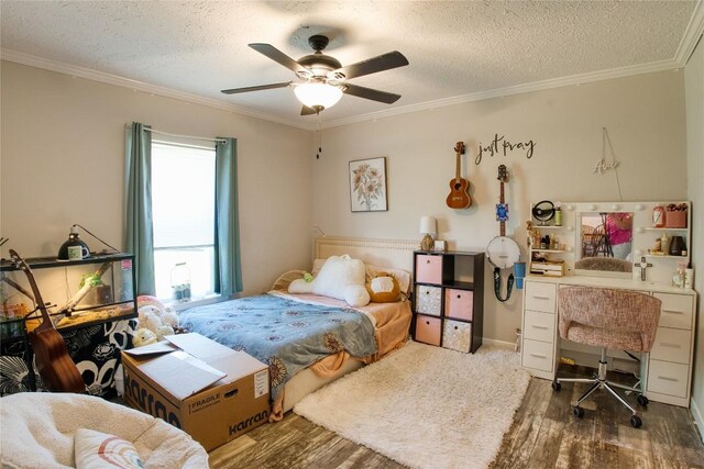 134 Primrose Ln, Edinboro, PA 16412 - bedroom with ornamental molding, wood finished floors, a textured ceiling, an office area, and a ceiling fan
