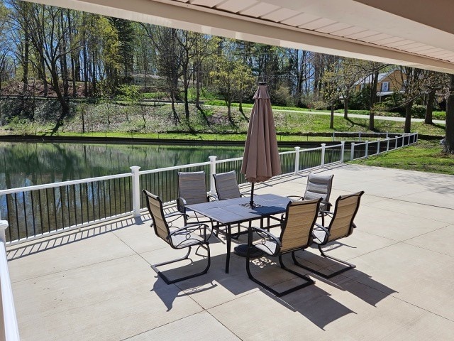 1925 N Mill St, North East, PA 16428 - view of patio with a water view and outdoor dining area