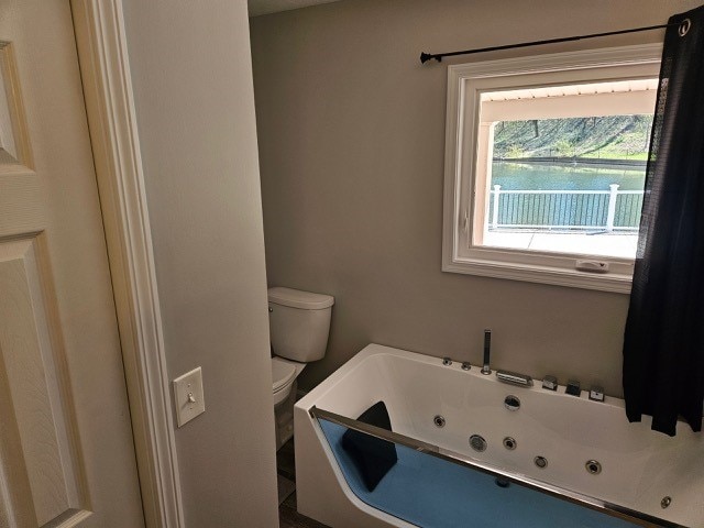 1925 N Mill St, North East, PA 16428 - full bath with toilet and a tub with jets