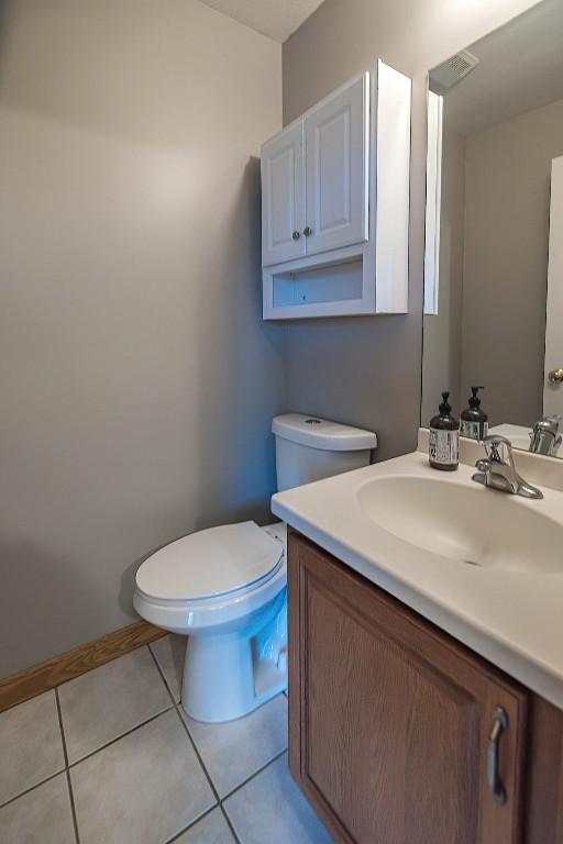 4119 Wood Hills Dr Unit C23, Erie, PA 16510 - bathroom featuring toilet, vanity, tile patterned floors, and baseboards